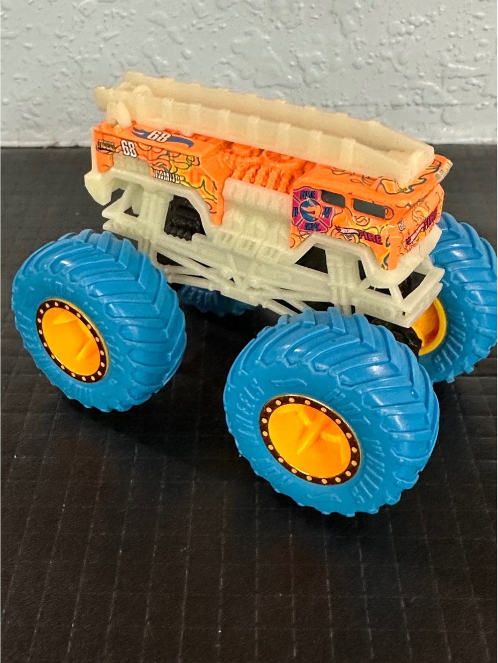 Hot Wheels Monster Truck Toy with Blue Tires and Orange Body